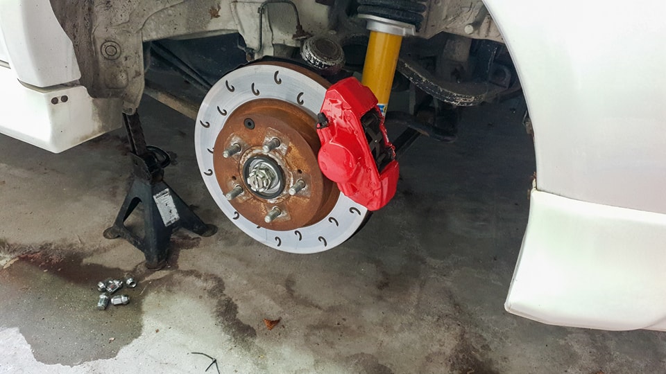 Brake caliper painting on a Mitsubishi Lancer EVO